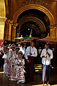 Ear piercing ceremony at Mahamuni Buddha Temple, Myanmar 